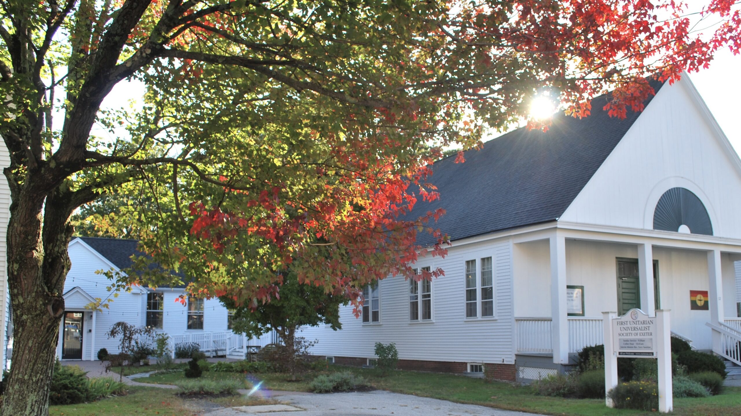 Autumn photo of FUUSE building with sun rising over roof